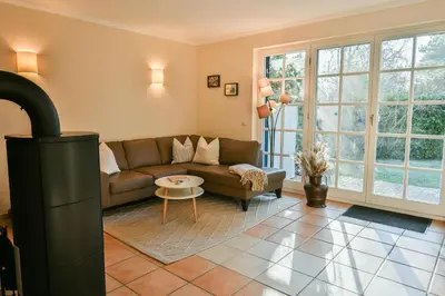 Ein Sitzbereich in der Unterkunft FH Tannenwieck - FH Tannenwieck Ferienwohnung Kormoran EG