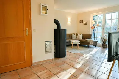 Ein Sitzbereich in der Unterkunft FH Tannenwieck - FH Tannenwieck Ferienwohnung Kormoran EG