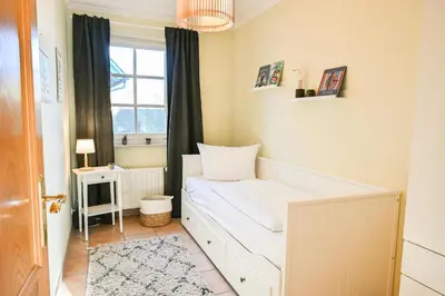 Ein Bett oder Betten in einem Zimmer der Unterkunft FH Tannenwieck - FH Tannenwieck Ferienwohnung Kormoran EG