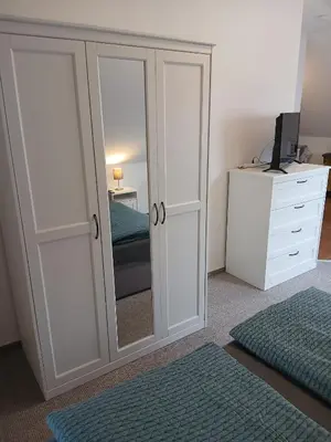 Ein Bett oder Betten in einem Zimmer der Unterkunft Kranich