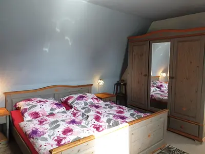 Ein Bett oder Betten in einem Zimmer der Unterkunft Lachmöwe