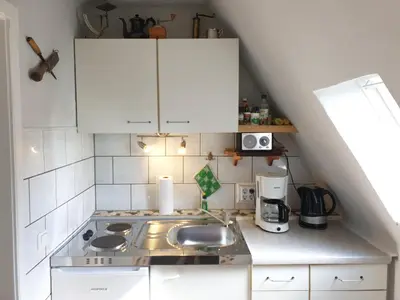Küche/Küchenzeile in der Unterkunft Lachmöwe