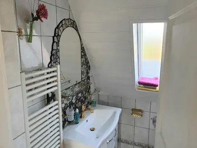 Ein Badezimmer in der Unterkunft Lachmöwe