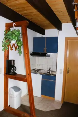 Küche/Küchenzeile in der Unterkunft Pension Martens - Mansadenwohnung