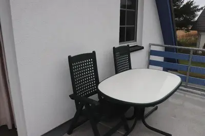 Ein Balkon oder eine Terrasse in der Unterkunft Pension Martens - Mansadenwohnung