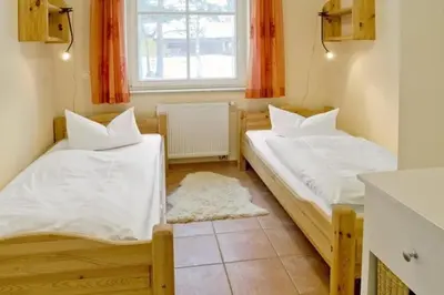 Ein Bett oder Betten in einem Zimmer der Unterkunft Residenz am Haferland