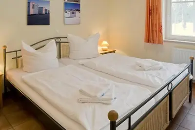 Ein Bett oder Betten in einem Zimmer der Unterkunft Residenz am Haferland