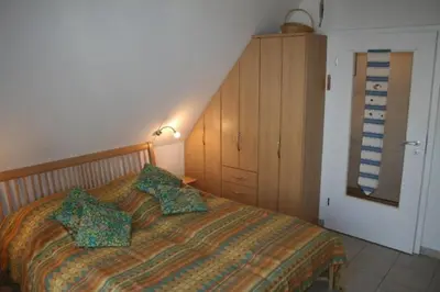 Ein Bett oder Betten in einem Zimmer der Unterkunft Residenz am Haferland Whg 14