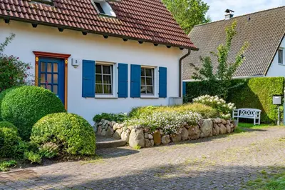 Ein Garten an der Unterkunft FH Tannenwieck - FH Tannenwieck Ferienwohnung Seeadler DG