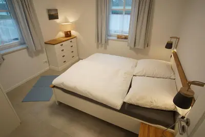Ein Bett oder Betten in einem Zimmer der Unterkunft Admirals Corner Lee