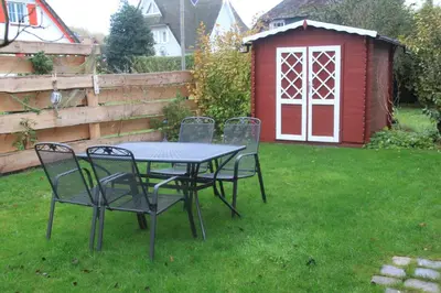 Ein Garten an der Unterkunft Haus 