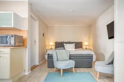 Ein Bett oder Betten in einem Zimmer der Unterkunft Villa Mare Whng 2