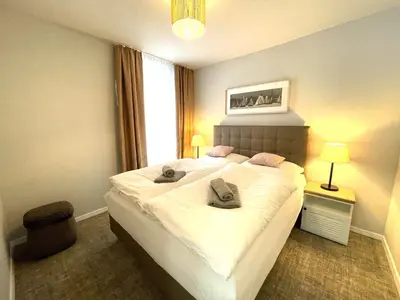 Ein Bett oder Betten in einem Zimmer der Unterkunft Baltic Lagoon Resort - Appartement 12