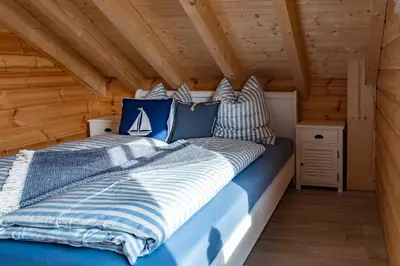 Ein Bett oder Betten in einem Zimmer der Unterkunft Kranichglück