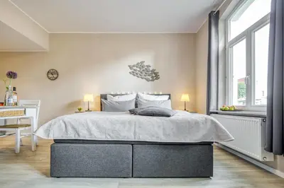 Ein Bett oder Betten in einem Zimmer der Unterkunft Villa Mare Whg 3