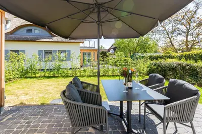 Ein Garten an der Unterkunft Windlooper 2