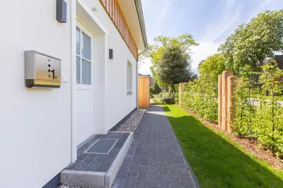 Ein Garten an der Unterkunft Windlooper 2