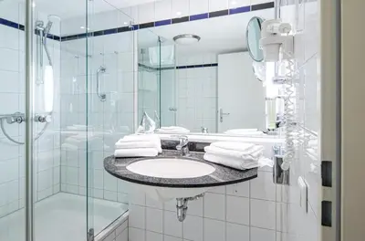 Ein Badezimmer in der Unterkunft Ferienwohnung Seebär an der Seebrücke Zingst - ruhig gelegen mit Terrasse