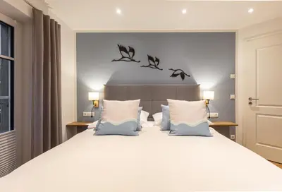 Ein Bett oder Betten in einem Zimmer der Unterkunft Windlooper 1