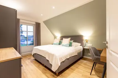 Ein Bett oder Betten in einem Zimmer der Unterkunft Windlooper 1