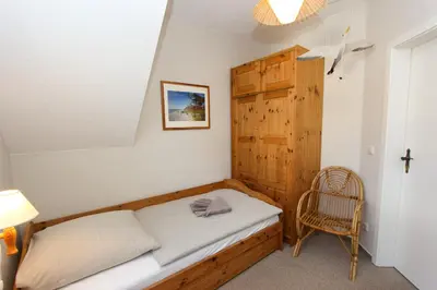 Ein Bett oder Betten in einem Zimmer der Unterkunft Segelzeit