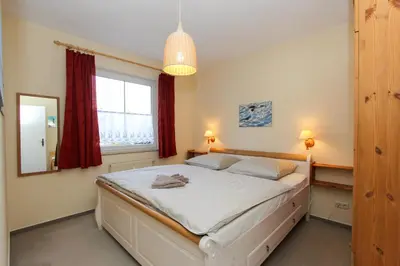 Ein Bett oder Betten in einem Zimmer der Unterkunft Segelzeit