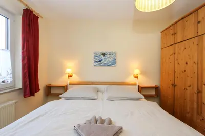 Ein Bett oder Betten in einem Zimmer der Unterkunft Segelzeit