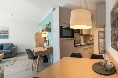 Küche/Küchenzeile in der Unterkunft Ferienwohnung Ostseesonne - 5-Sterne-Urlaub mit Balkon direkt an der Ostsee