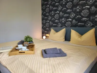 Ein Bett oder Betten in einem Zimmer der Unterkunft Haus Alex Erdgeschoss