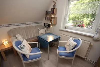 Ein Sitzbereich in der Unterkunft Appartement Ostseemuschel
