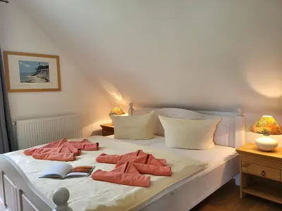 Ein Bett oder Betten in einem Zimmer der Unterkunft Ferienwohnung Frida