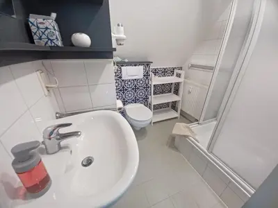 Ein Badezimmer in der Unterkunft Ferienhof Darsser Ort