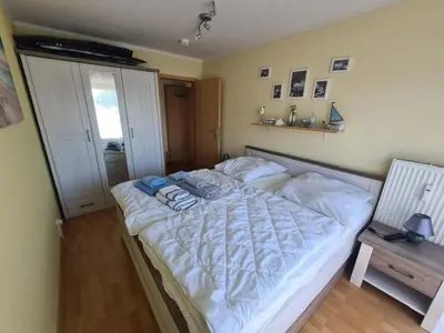 Ein Bett oder Betten in einem Zimmer der Unterkunft Meeresbrise