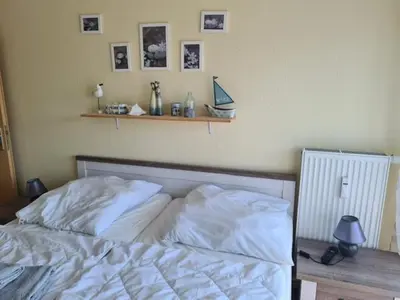 Ein Bett oder Betten in einem Zimmer der Unterkunft Meeresbrise