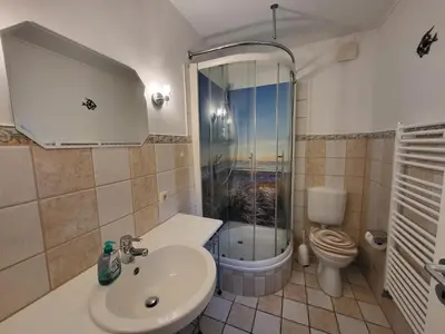 Ein Badezimmer in der Unterkunft Strandperle Buchenhof 5 D