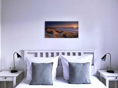 Ein Bett oder Betten in einem Zimmer der Unterkunft FW Backbord Brücke