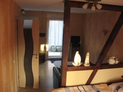 Ein Bett oder Betten in einem Zimmer der Unterkunft Ferienzimmer Hühnernest Hirtenweg 3
