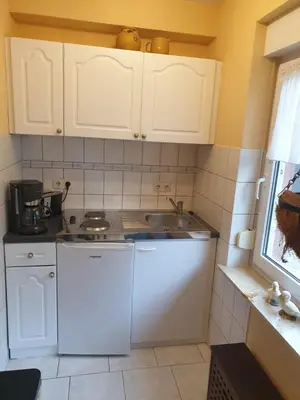 Küche/Küchenzeile in der Unterkunft Ferienzimmer Hühnernest Hirtenweg 3