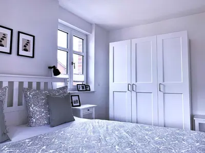 Ein Bett oder Betten in einem Zimmer der Unterkunft FW Steuerbord Peildeck