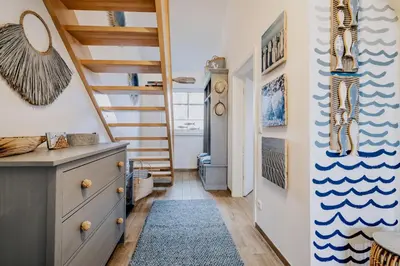 Ein Bett oder Betten in einem Zimmer der Unterkunft Ostseeblau