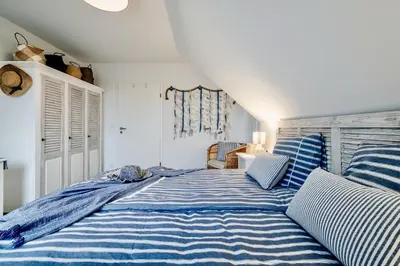 Ein Bett oder Betten in einem Zimmer der Unterkunft Ostseeblau