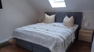 Ein Bett oder Betten in einem Zimmer der Unterkunft Appartement Strand Heim