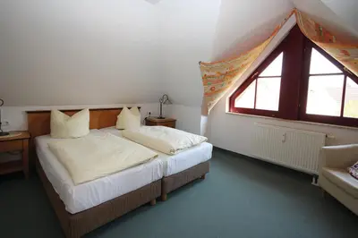 Ein Bett oder Betten in einem Zimmer der Unterkunft Oewern Diek 60