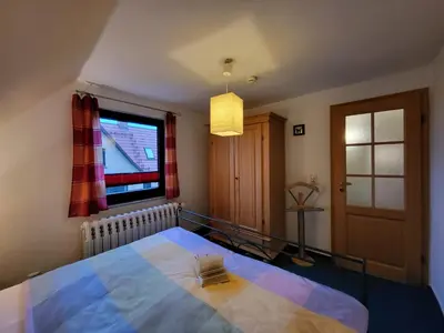 Ein Bett oder Betten in einem Zimmer der Unterkunft Am Norderfeld