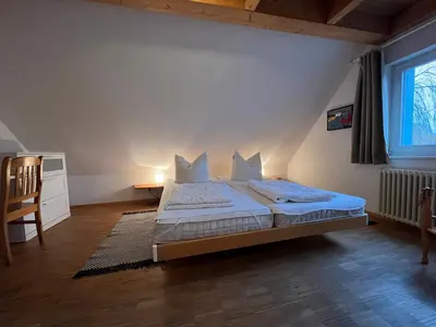 Ein Bett oder Betten in einem Zimmer der Unterkunft Viermaster