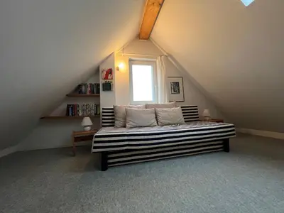 Ein Bett oder Betten in einem Zimmer der Unterkunft Viermaster