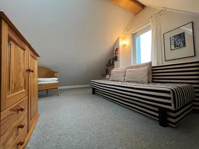 Ein Bett oder Betten in einem Zimmer der Unterkunft Viermaster