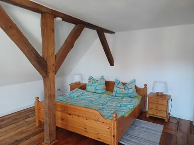 Ein Bett oder Betten in einem Zimmer der Unterkunft Ferienwohnung Hinz