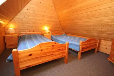Ein Bett oder Betten in einem Zimmer der Unterkunft Ferienwohnung Hinz