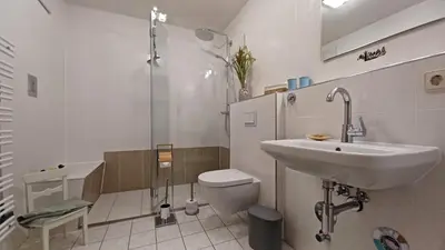 Ein Badezimmer in der Unterkunft An der Schmiedestraße Bernstein